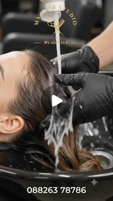 Hair being washed at a salon basin during a My Hair Studio service